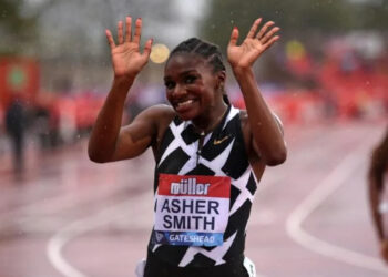 Britain's Dina Asher-Smith celebrates after winning the women's 100m final at the Diamond League athletics meeting in Gateshead | AFP