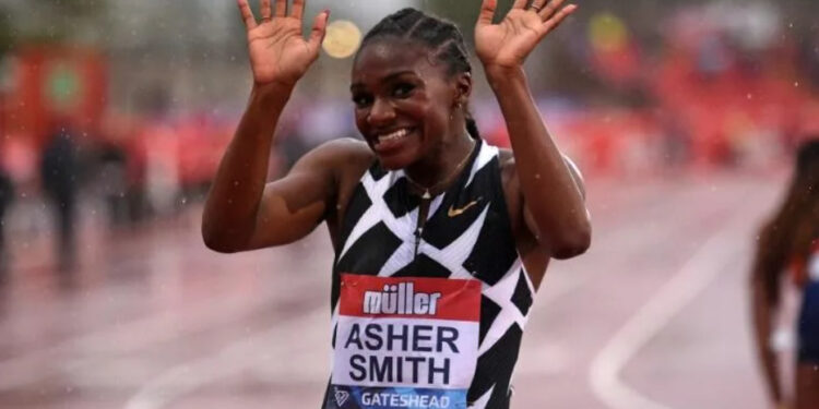 Britain's Dina Asher-Smith celebrates after winning the women's 100m final at the Diamond League athletics meeting in Gateshead | AFP