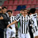 Juventus forward Paulo Dybala (C) and Alvaro Morata (2ndL) celebrate after booking a Champions League berth | AFP