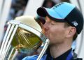 England captain Eoin Morgan kisses the World Cup trophy after his side's triumph at Lord's in 2019 | AFP