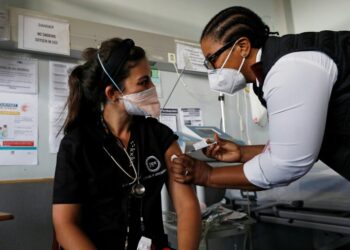 Health workers have been among the first to be vaccinated in South Africa | AFP