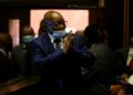 Zuma greets supporters before his corruption trial is postponed | AFP