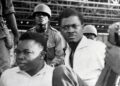 Soldiers guard Patrice Lumumba who was killed on January 17, 1961, by separatists and Belgian mercenaries | AFP