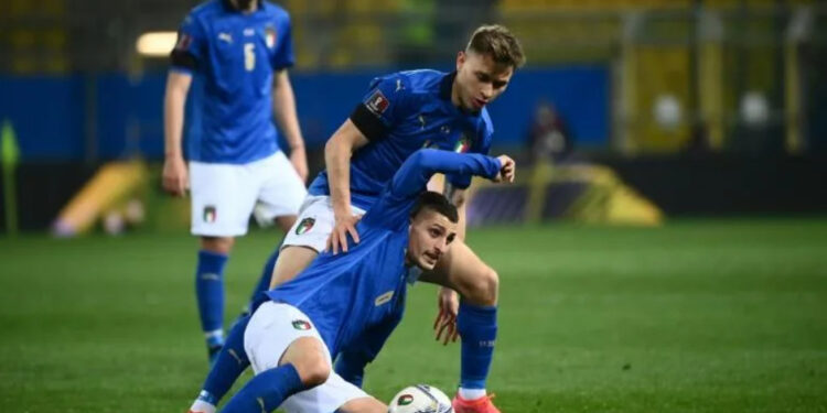 Marco Verratti (bottom) missed Italy's Euro 2020 opener with a knee injury | AFP