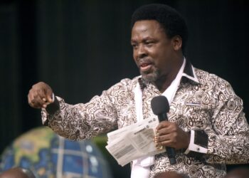 TB Joshua, known for his 'miracles' and 'resurrections', had an estimated fortune of several million dollars, according to Forbes | AFP