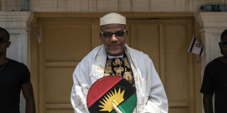 Biafran separatist leader Nnamdi Kanu, holding the flag of the breakaway republic at commemorations in 2017 to mark the 50th anniversary of the outbreak of the civil war | AFP