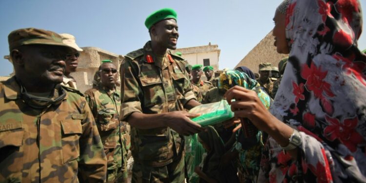 Major General Paul Lokech served two stints in Somalia | AFP