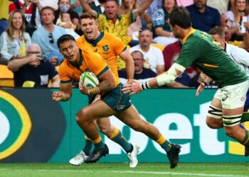 Australia's Len Ikitau scores one of his two tries against South Africa in Brisbane on Saturday | AFP