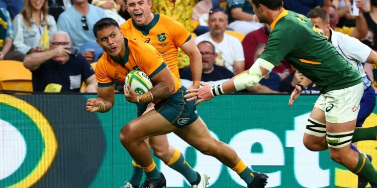 Australia's Len Ikitau scores one of his two tries against South Africa in Brisbane on Saturday | AFP
