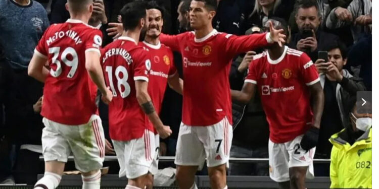 Cristiano Ronaldo (2nd right) celebrates his goal for Manchester United against Tottenham | AFP/Glyn KIRK