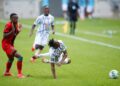 Christian Kouame (R) of the Ivory Coast is fouled by Charles Petro (L) of Malawi during a World Cup qualifier in Soweto, South Africa, on Friday | AFP