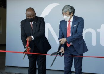 Scissor ceremony: President Cyril Ramaphosa, left, joins biotech tycoon Patrick Soon-Shiong in launching the vaccine hub | AFP