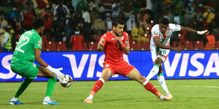 Dango Ouattara (R) scores for Burkina Faso in an Africa Cup of Nations quarter-final against Tunisia in Garoua on Saturday | AFP