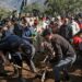 Moroccans bury five-year-old Rayan Oram in the village of Ighrane in Morocco's rural northern province of Chefchaouen | AFP