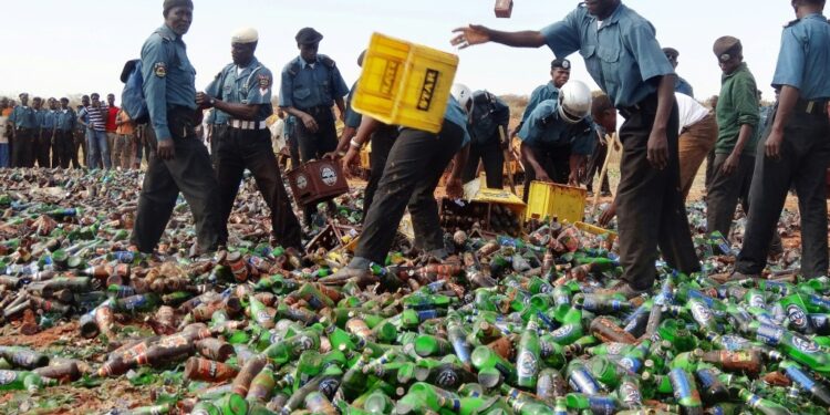Hisbah religious police often destroy alcohol, as here in a previous crackdown | AFP