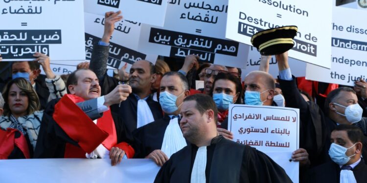 Tunisian judges have denounced President Kais Saied's move to dissolve a key judicial watchdog as a violation of rights and freedoms | AFP