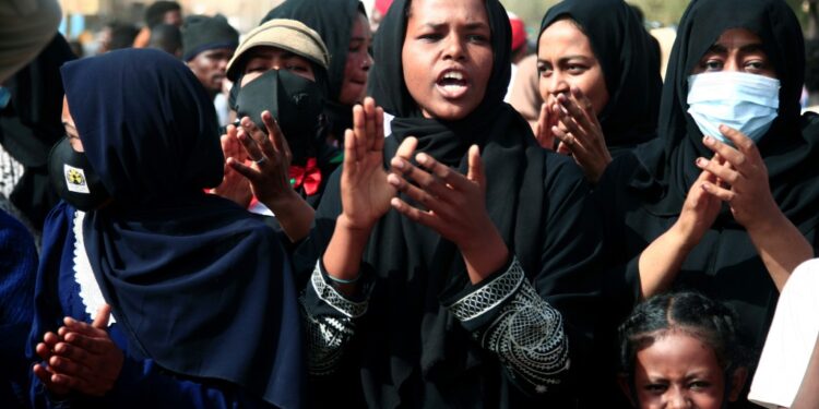 Sudanese women chant slogans calling for civilian rule and denouncing the military administration on February 10 | AFP