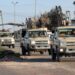 Vehicles of military brigades loyal to the Libyan unity government headed by Abdulhamid Dbeibah arrive from neighboring towns to the capital Tripoli | AFP