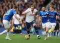 Harry Kane of Tottenham Hotspur battles for possession with Seamus Coleman and Anthony Gordon of Everton Photo by Clive Brunskill/Getty Images