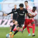 Frankfurt's Japan midfielder Daichi Kamada (L) is their top-scorer in the Europa League this season with four goals in eight appearances |  AFP/Ronny Hartmann