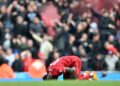Senegal star Sadio Mane celebrates scoring the second equaliser for Liverpool in a 2-2 Premier League draw at Manchester City on April 10, 2022 | AFP