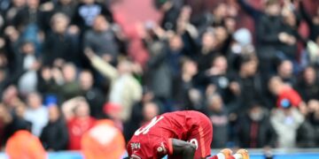 Senegal star Sadio Mane celebrates scoring the second equaliser for Liverpool in a 2-2 Premier League draw at Manchester City on April 10, 2022 | AFP