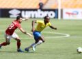 Star Mamelodi Sundowns forward Peter Shalulile (R) attacks in a CAF Champions' League group match against Egyptian opponents Al Ahly | AFP
