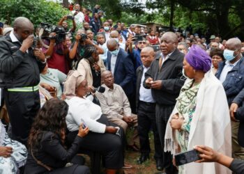 Ramaphosa and the minister of cooperative governance, Nkosazana Dlamini Zuma, right, met flood victims in Clermont, a township of Durban | AFP