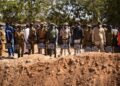 Jihadist toll: Military officials at Gounghin cemetery in Ouagadougou last November, bearing signs with the names of soldiers killed in an attack the week before | AFP