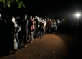 Voters queue to cast their ballots during presidential and parliamentary elections in 2013 | Reuters/Thomas Mukoya