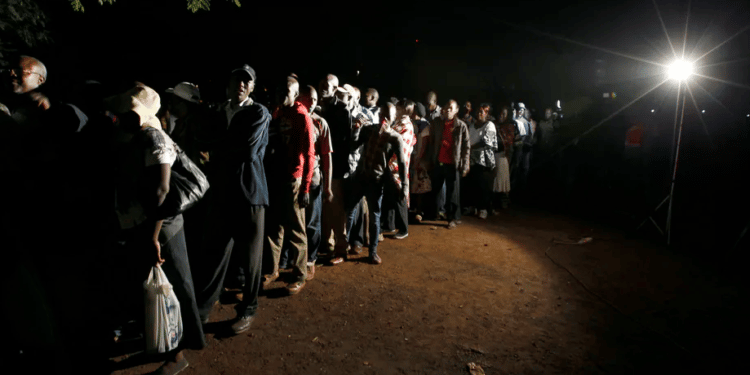 Voters queue to cast their ballots during presidential and parliamentary elections in 2013 | Reuters/Thomas Mukoya
