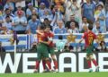 Portugal players celebrate after scoring a goal against Uruguay at the World Cup: IMAGE/Getty Images