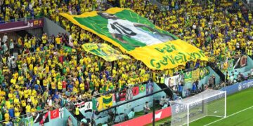 Brazilian fans showing a flag featuring football legend Pele saying 'Get well soon'
Photo: Courtesy