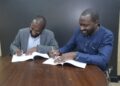 Ebenezer Degu, CEO Workstyle Africa (L) and Joram Mwinamo, CEO SNDBX (R), during the signing of a partnership MOU. Photo/Workstyle Africa