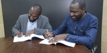Ebenezer Degu, CEO Workstyle Africa (L) and Joram Mwinamo, CEO SNDBX (R), during the signing of a partnership MOU. Photo/Workstyle Africa