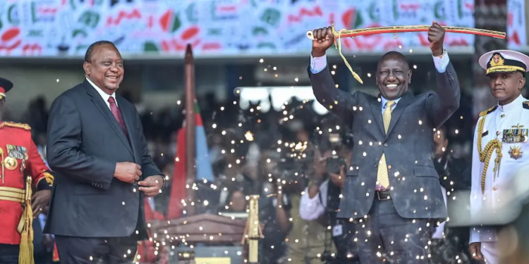 William Ruto is sworn-in as Kenya’s president in September 2022. Former President Uhuru Kenyatta looks on | Tony Karumba/AFP via Getty Images