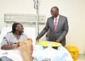 President Ruto has a light moment with a patient during the official opening of the AAR Hospital - Kiambu Road, Nairobi County.Photo/PCS