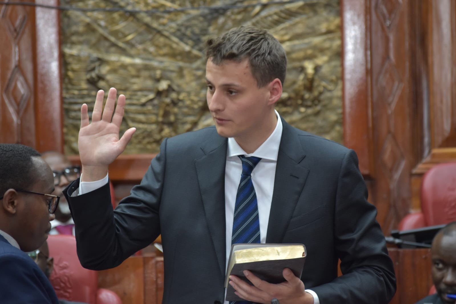 Worldcoin CEO Alex Blania takes oath before answering to questions from the ad Hoc Committee.
